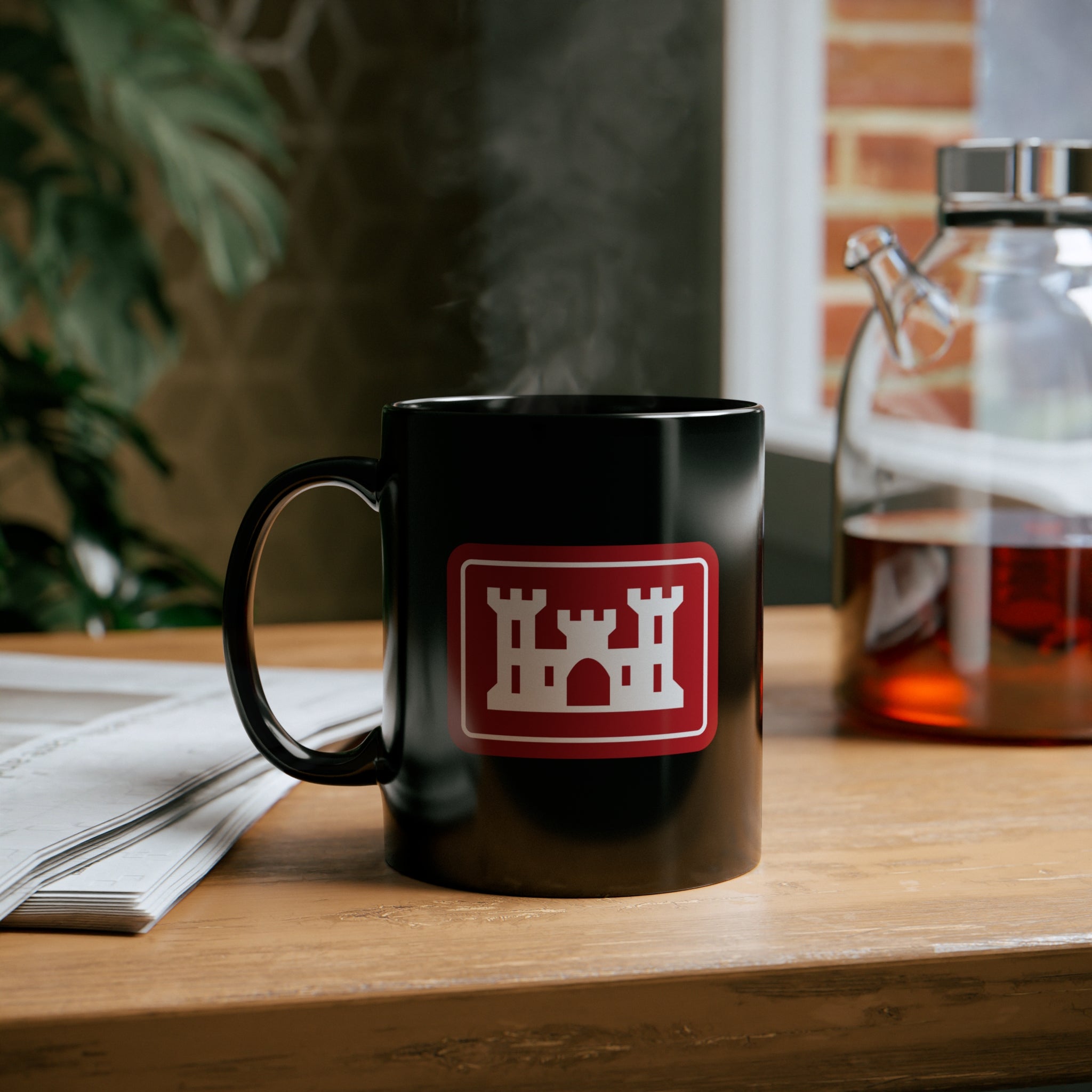 corps of engineers insignia on a black coffee mug.
