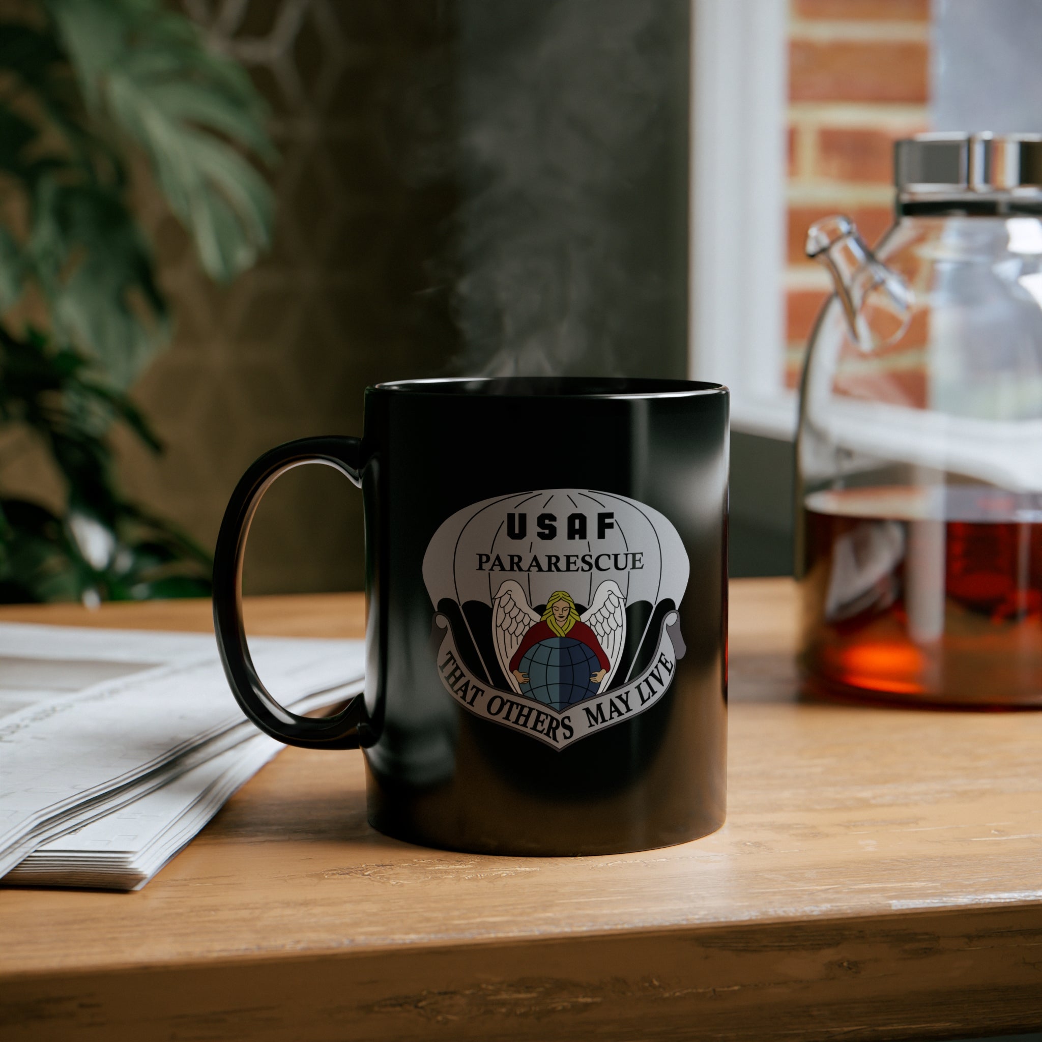 US air force pararescue insignia on a black coffee mug.