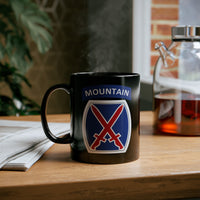 10th mountain insignia on a black coffee mug