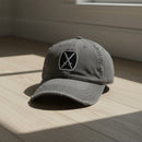 Distressed dad hat with 10th Mountain insignia