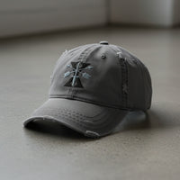 Distressed dad hat with 10th special forces group roman numeral design