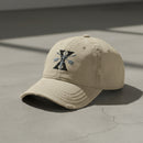 Distressed dad hat with 10th special forces group roman numeral design