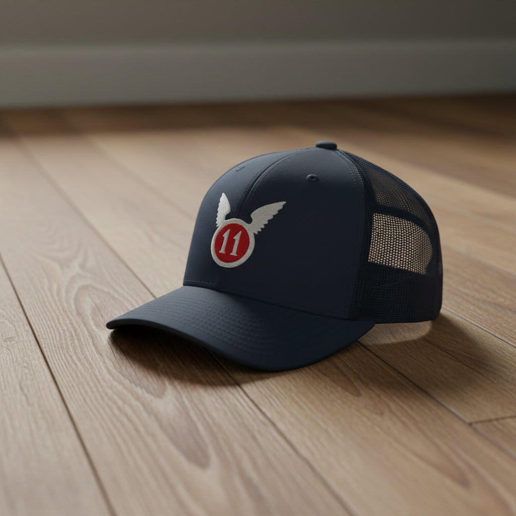 snapback trucker hat embroidered with the 11th airborne insignia.