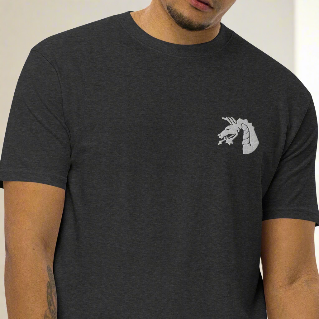 18th airborne corps dragon design embroidered on the left chest of a t-shirt.