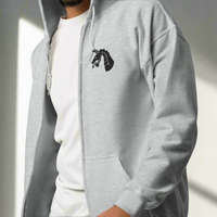18th airborne corps dragon insignia embroidered on the left chest of a full zip hoodie