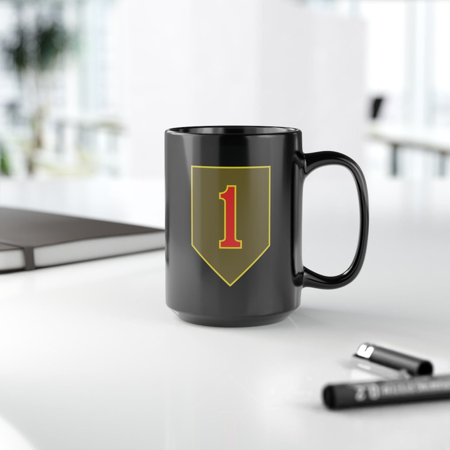 1st infantry division insignia on a black coffee mug.