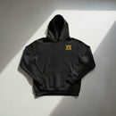 black hoodie with 20th special forces insignia and roman numeral design on the left chest. 