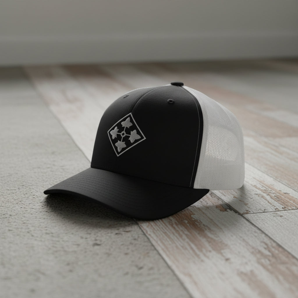 4th infantry division insignia embroidered on a snapback trucker hat
