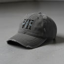 Distressed dad hat with 7th special forces group roman numeral design