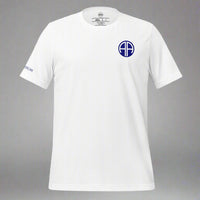 white t-shirt with 82nd airborne insignia and all american motto.