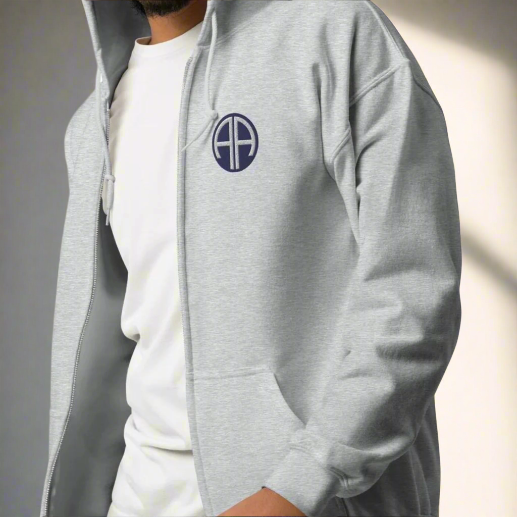 82nd airborne insignia embroidered on the left chest of a full zip hoodie.