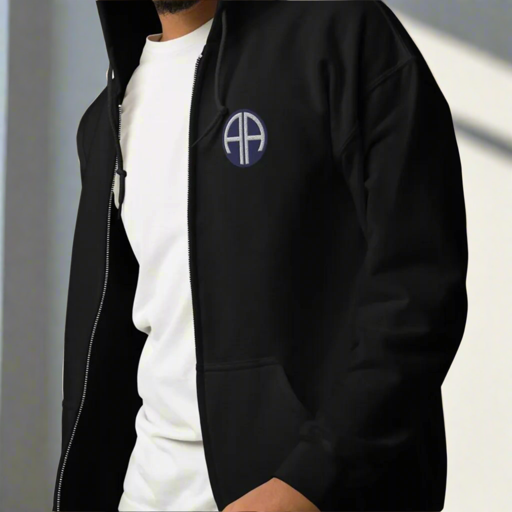 82nd airborne insignia embroidered on the left chest of a full zip hoodie.