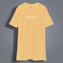Men's gold t-shirt with the words Humble Sundays across the chest.