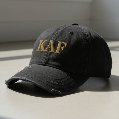 distressed dad hat with the text KAF for kandahar airfield 