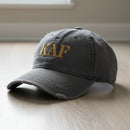 distressed dad hat with the text KAF for kandahar airfield 