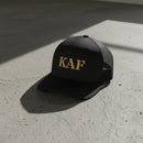 snapback trucker hat with text 'KAF' embroidered 