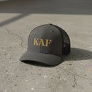 snapback trucker hat with text 'KAF' embroidered 