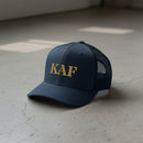 snapback trucker hat with text 'KAF' embroidered 