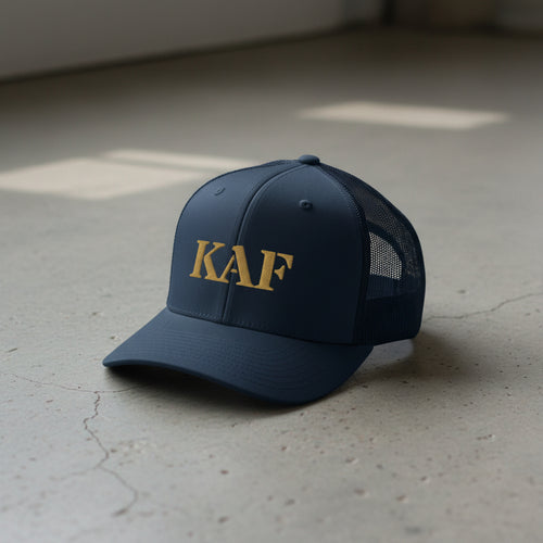 snapback trucker hat with text 'KAF' embroidered 