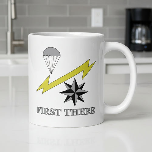 White coffee mug with Air Force Combat Control Team insignia design.