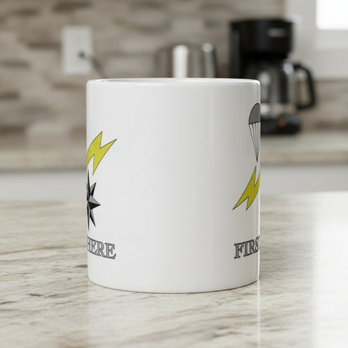 White coffee mug with Air Force Combat Control Team insignia design.