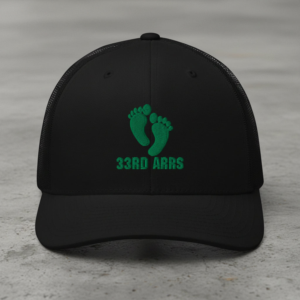 black snapback trucker hat with air force pj green feet 33rd ARRS embroidered design