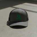 charcoal snapback trucker hat with air force pj green feet 33rd ARRS embroidered design