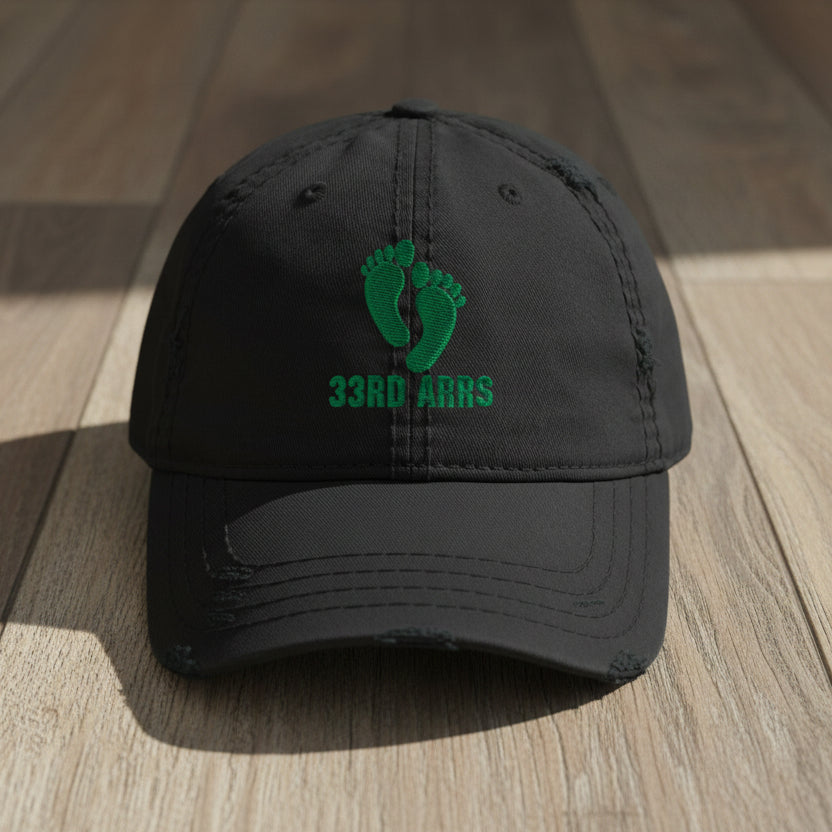black distressed dad hat with air force pj green feet 33rd ARRS embroidered design