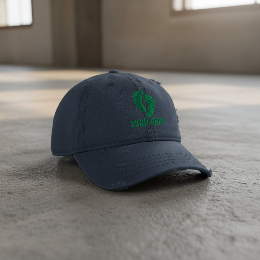 navy distressed dad hat with air force pj green feet 33rd ARRS embroidered design