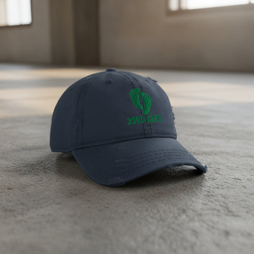 navy distressed dad hat with air force pj green feet 33rd ARRS embroidered design