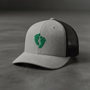 air force pararescue pj green feet embroidered on a snapback trucker hat.