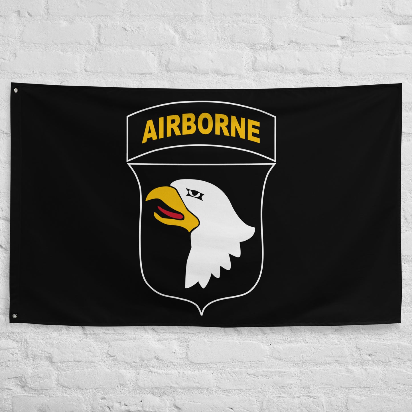 101st airborne insignia on a black flag.