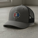 charcoal trucker hat with embroidered "250" inside a circle of stars for america 250th anniversary and 4th of july