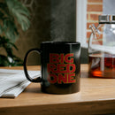 Big red one words on a black 11oz coffee mug. 