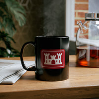 corps of engineers insignia on a black coffee mug.
