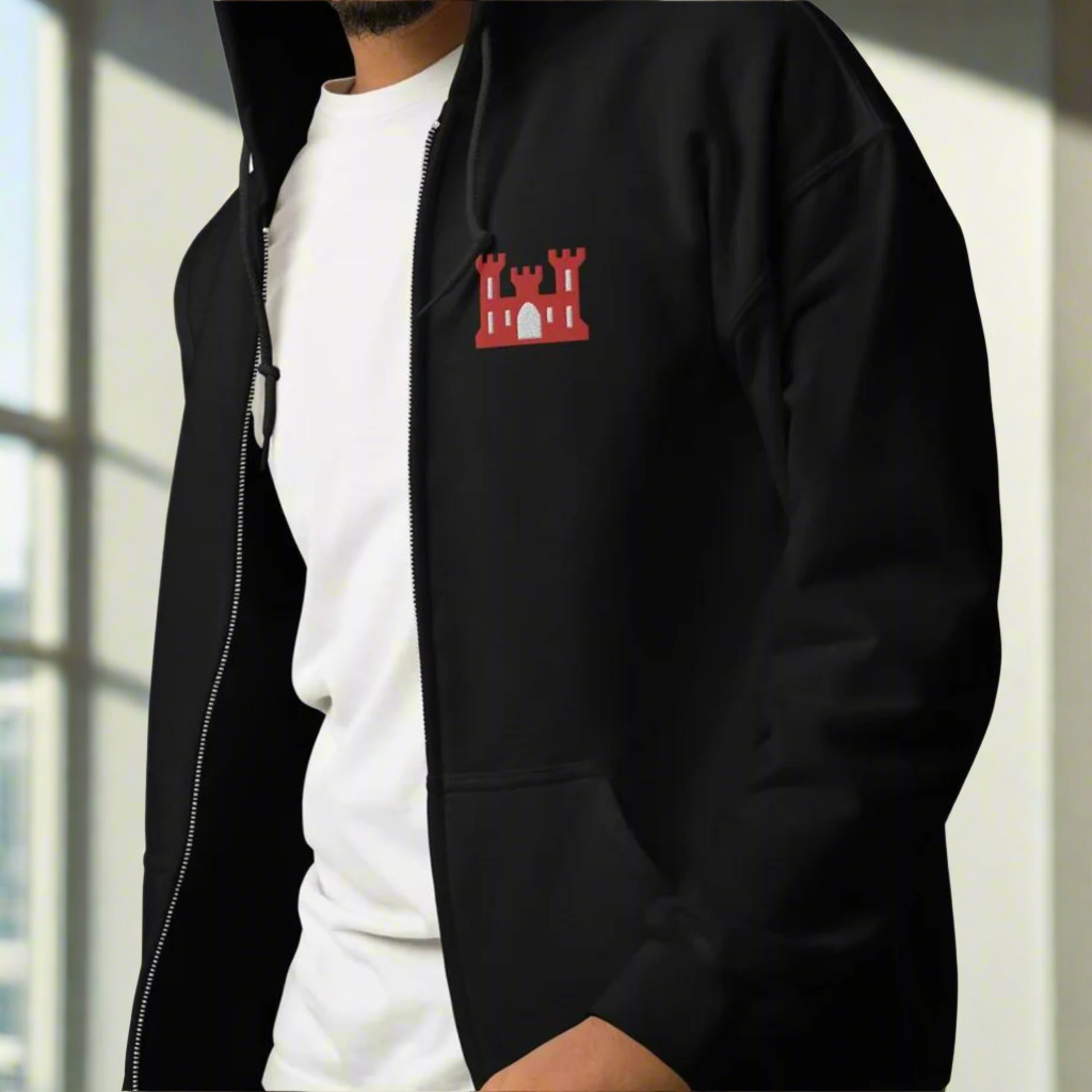 Army corps of engineers insignia embroidered design on the left chest of a full zip hoodie.