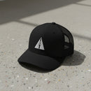 black snapback trucker hat with embroidered delta force insignia