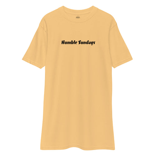 gold t-shirt with text "humble sundays" across the chest