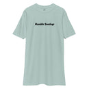 light blue t-shirt with text "humble sundays" across the chest