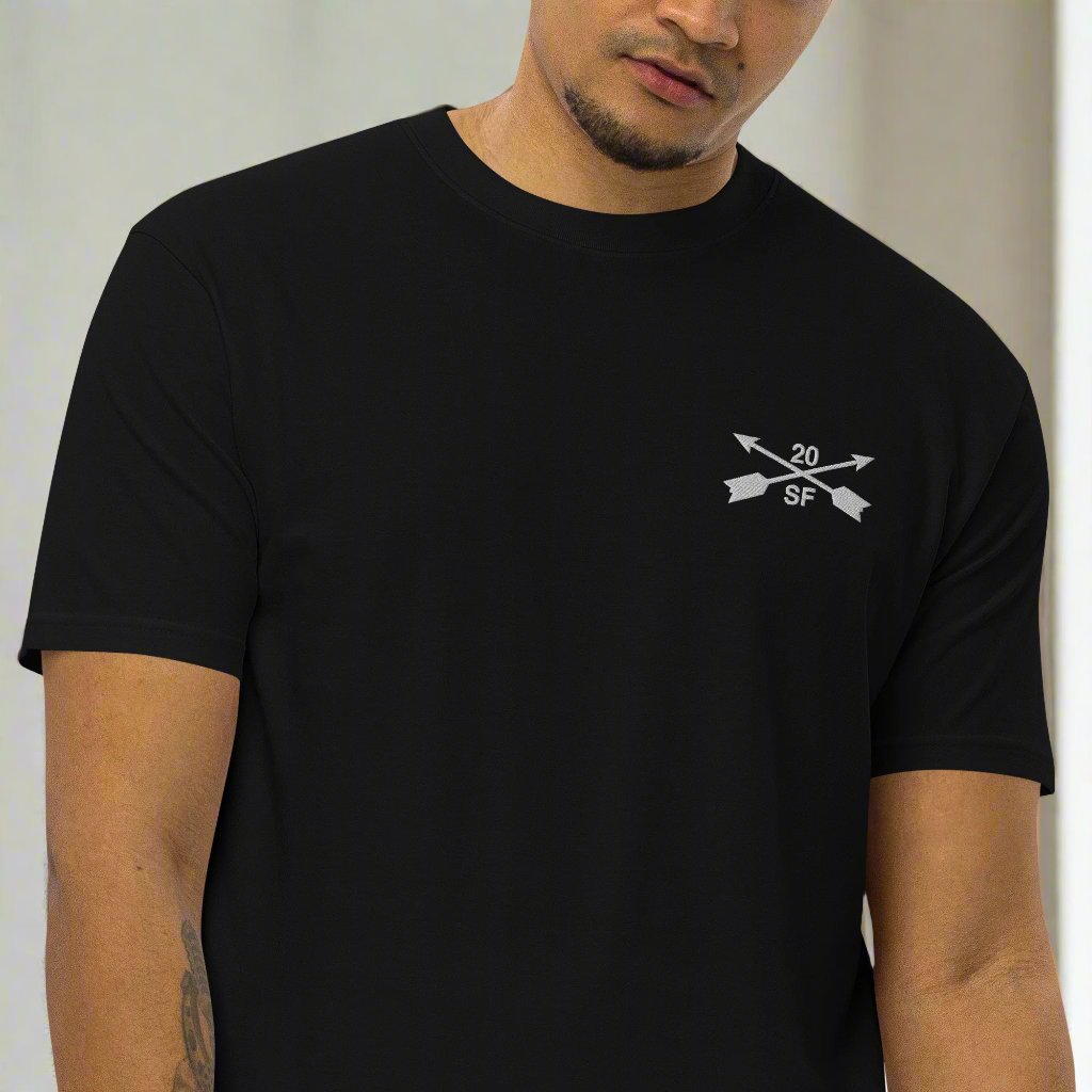 20th special forces design embroidered on the left chest of a t-shirt.