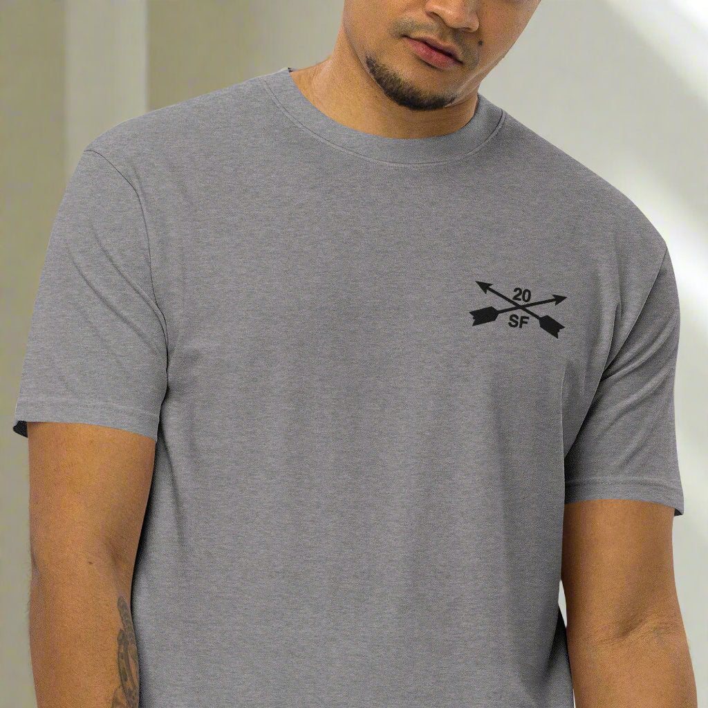 20th special forces design embroidered on the left chest of a t-shirt.