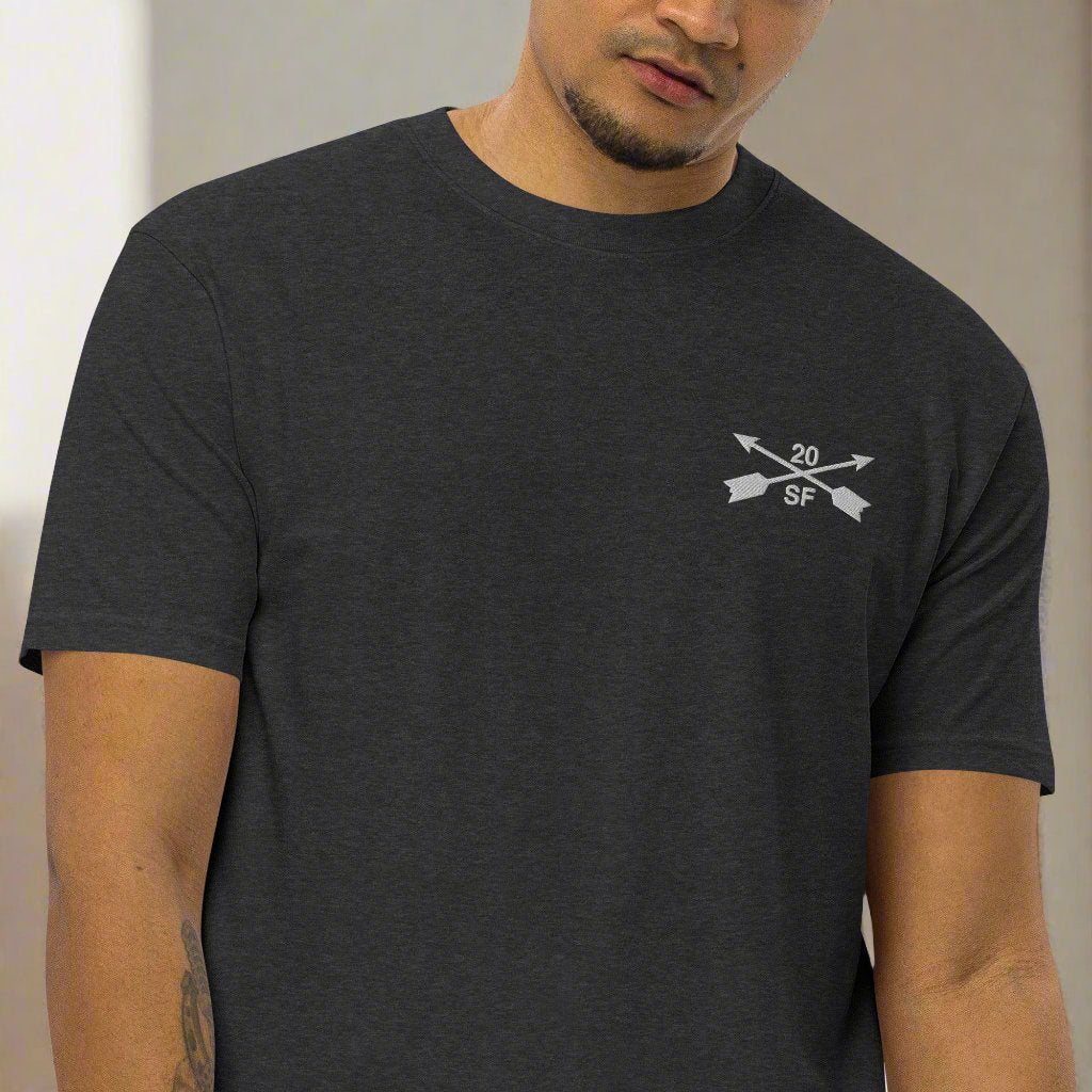 20th special forces design embroidered on the left chest of a t-shirt.