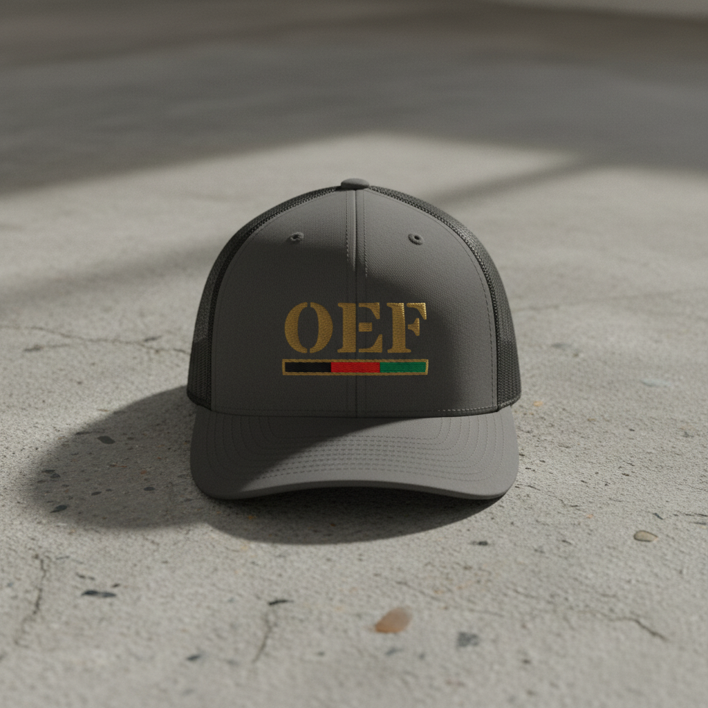 charcoal trucker hat with text 'OEF' embroidered