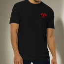 Man wearing a black t-shirt with tomahawk design and the text RLTW
