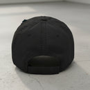black distressed dad hat embroidered with the words regular dude