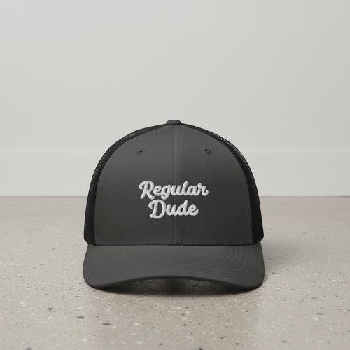 charcoal snapback cap with embroidered 'Regular Dude' text 