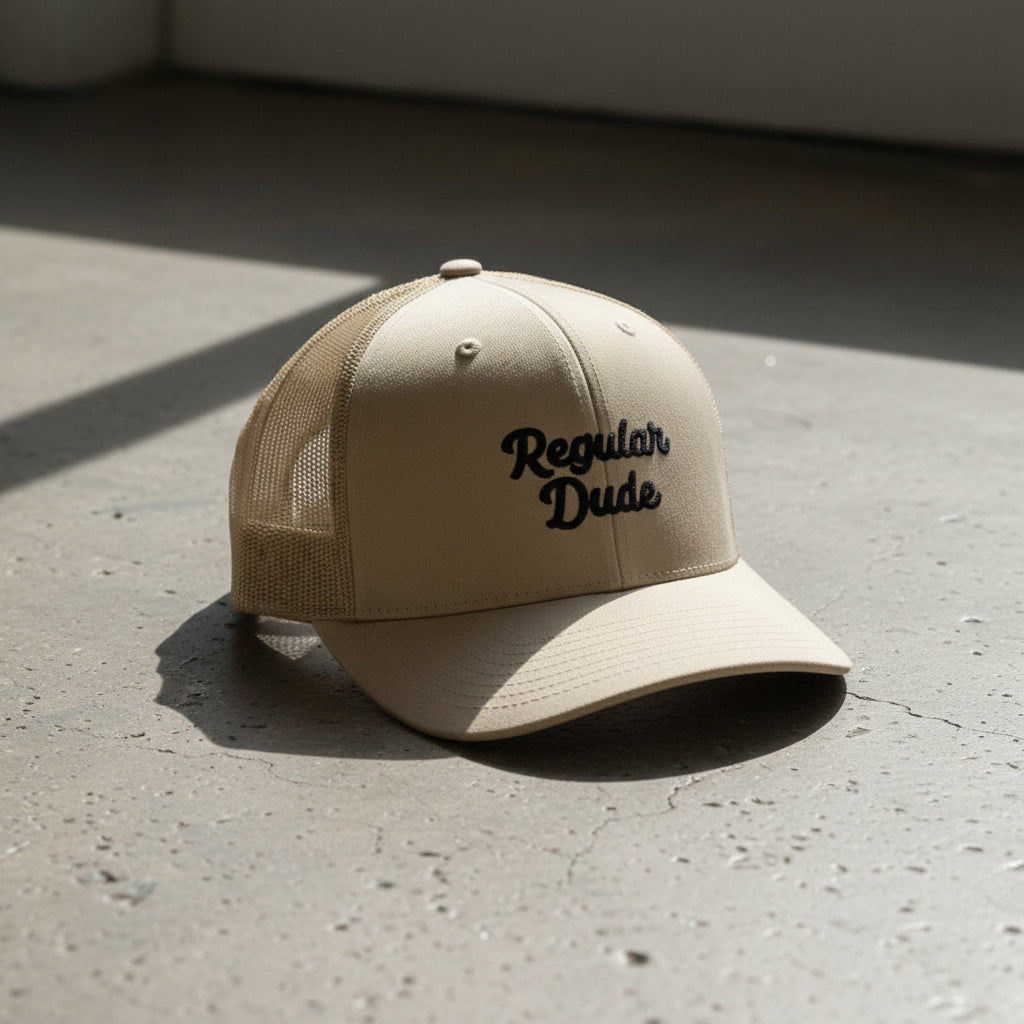 khaki snapback cap with embroidered 'Regular Dude' text 