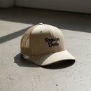 khaki snapback cap with embroidered 'Regular Dude' text 
