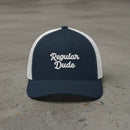 navy/white snapback cap with embroidered 'Regular Dude' text 