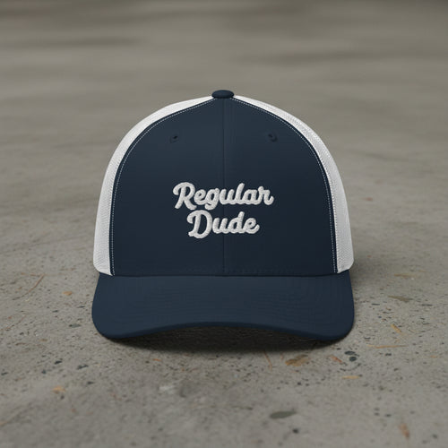 navy/white snapback cap with embroidered 'Regular Dude' text 